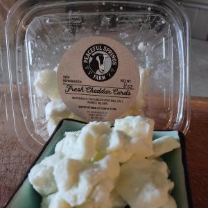 Fresh Cheddar Curds. Multiple product options available: 2